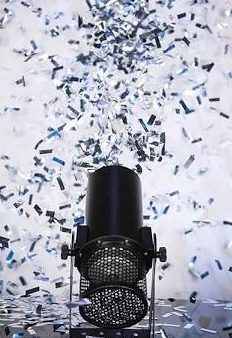 Equipment showering confetti from a microphone.
