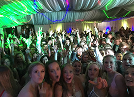 A group of people posing for a photo at a Denver Wedding or Events party.