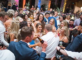 Denver Wedding and Events DJ Service providing music for a group of people dancing at a wedding reception.